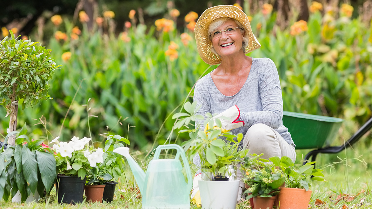 Smiling woman gardening